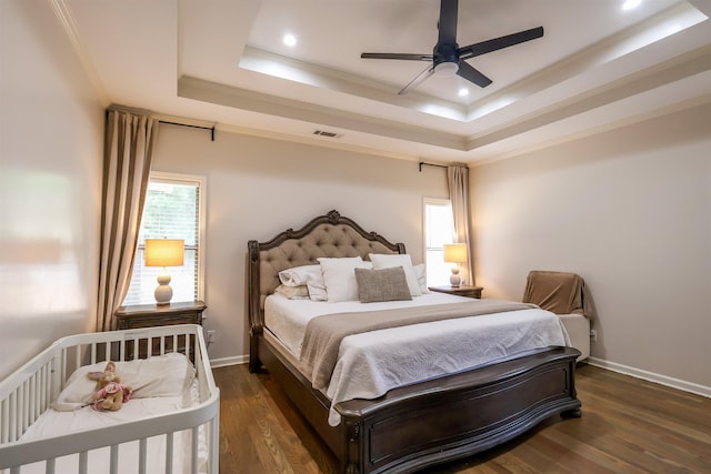 8510 Wolf Trace Ln, Bartlett, TN 38133 - bedroom featuring a tray ceiling, wood finished floors, ornamental molding, recessed lighting, and a ceiling fan
