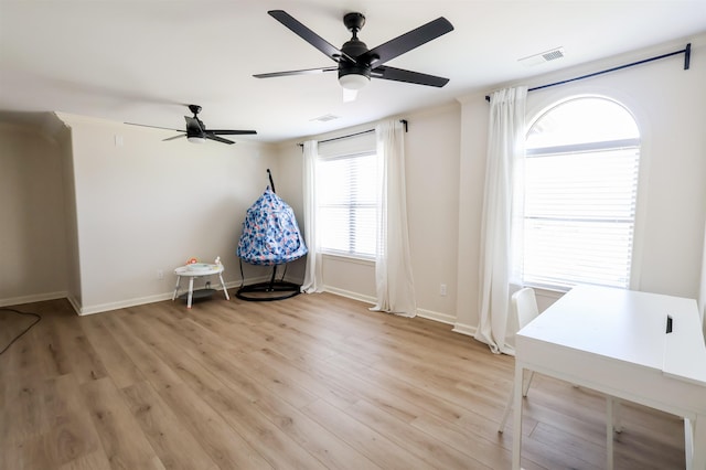 8510 Wolf Trace Ln, Bartlett, TN 38133 - sitting room with a ceiling fan and light wood-type flooring