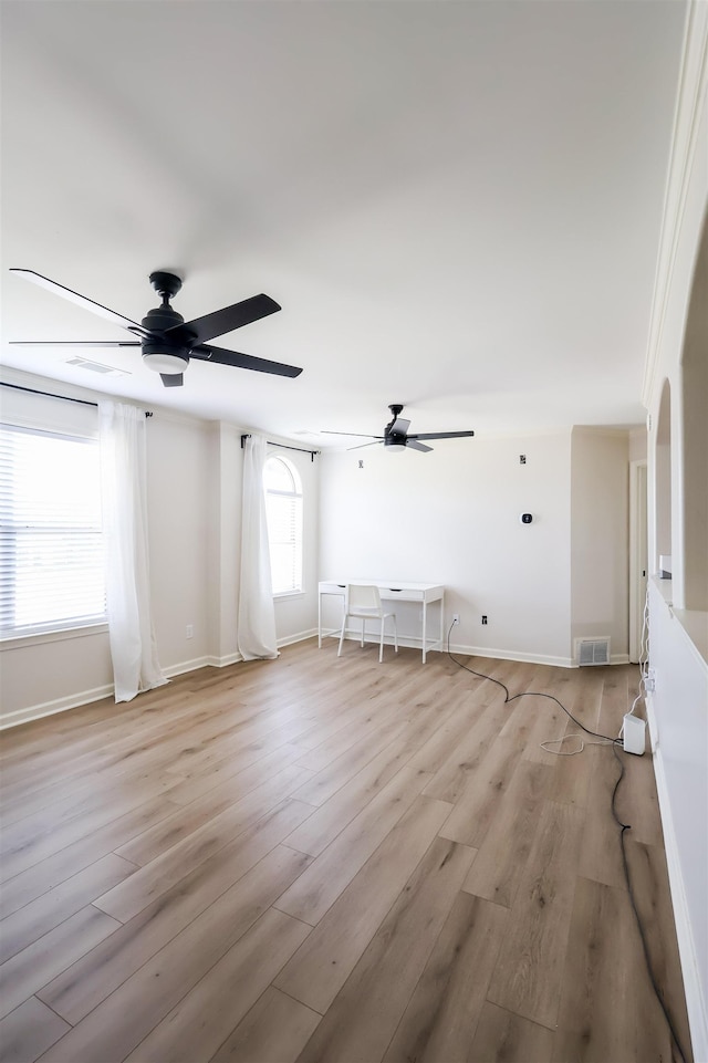 8510 Wolf Trace Ln, Bartlett, TN 38133 - spare room with ceiling fan and light wood finished floors