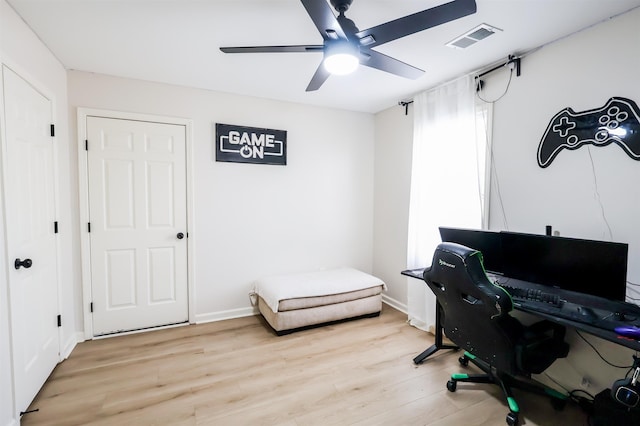 8510 Wolf Trace Ln, Bartlett, TN 38133 - home office with a ceiling fan and light wood-style floors