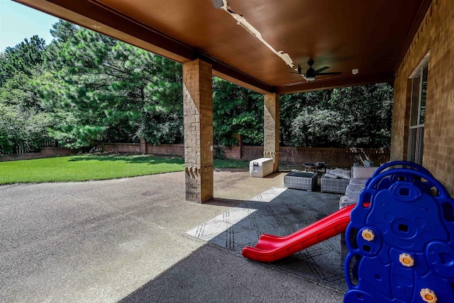 8510 Wolf Trace Ln, Bartlett, TN 38133 - fenced backyard featuring a ceiling fan and a patio area