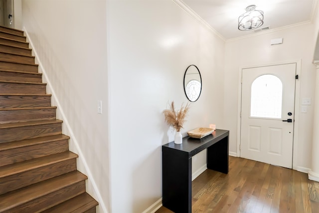 8510 Wolf Trace Ln, Bartlett, TN 38133 - foyer entrance featuring stairs, crown molding, and hardwood / wood-style flooring