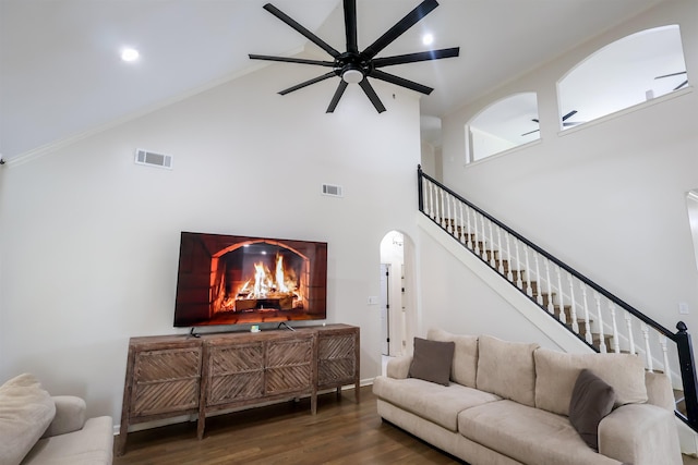8510 Wolf Trace Ln, Bartlett, TN 38133 - living area featuring wood finished floors, high vaulted ceiling, a ceiling fan, stairway, and recessed lighting