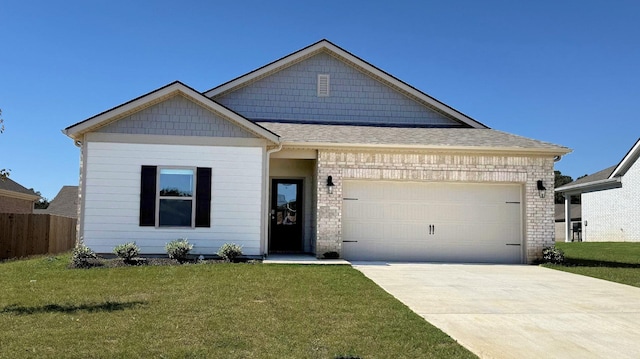 7995 Royster Creek Dr E, Millington, TN 38053 - view of front facade with a garage, concrete driveway, and roof with shingles