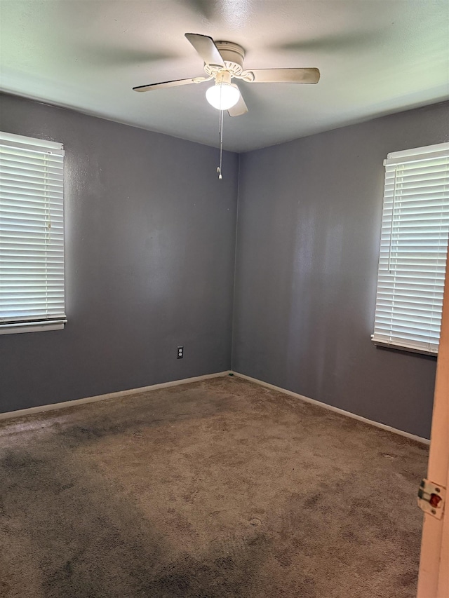 1493 Ragan St, Memphis, TN 38106 - spare room with ceiling fan and carpet flooring