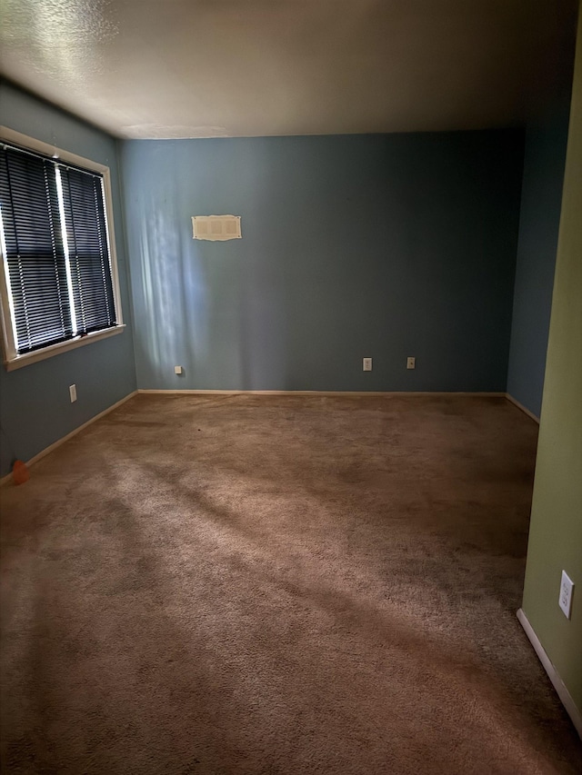 1493 Ragan St, Memphis, TN 38106 - carpeted spare room with baseboards