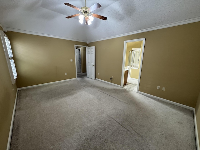 850 N Ericson Rd, Memphis, TN 38018 - unfurnished bedroom with ornamental molding, carpet floors, a textured ceiling, connected bathroom, and ceiling fan