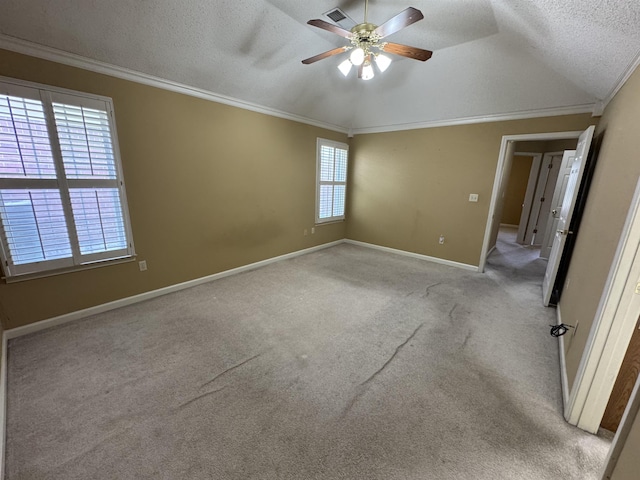 850 N Ericson Rd, Memphis, TN 38018 - carpeted spare room featuring a ceiling fan, a textured ceiling, crown molding, and lofted ceiling