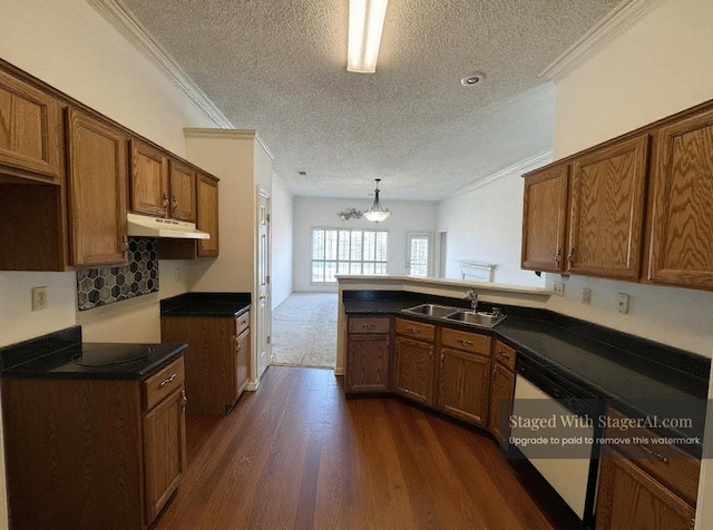 850 N Ericson Rd, Memphis, TN 38018 - kitchen featuring a textured ceiling, dishwasher, crown molding, dark wood-style floors, and brown cabinets