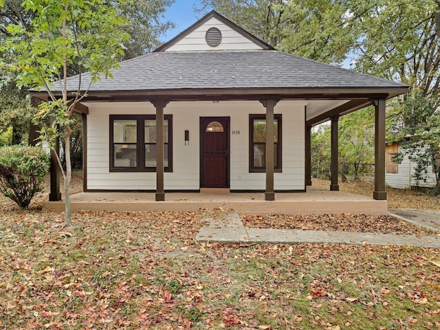 1438 Silver St, Memphis, TN 38106 - view of front of property with a shingled roof and covered porch