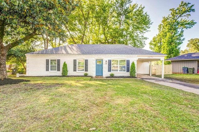 3693 Socorro Cv, Memphis, TN 38128 - ranch-style house with concrete driveway, a carport, a shingled roof, and brick siding