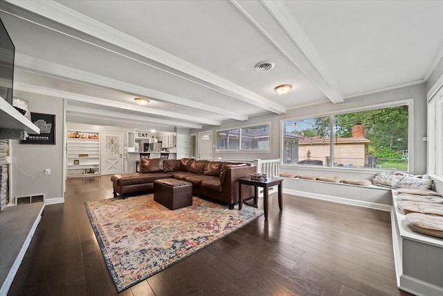 4583 E Dearing Rd, Memphis, TN 38117 - living room featuring beam ceiling, dark wood-style flooring, a fireplace, and crown molding