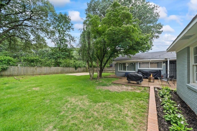 4583 E Dearing Rd, Memphis, TN 38117 - fenced backyard featuring a patio