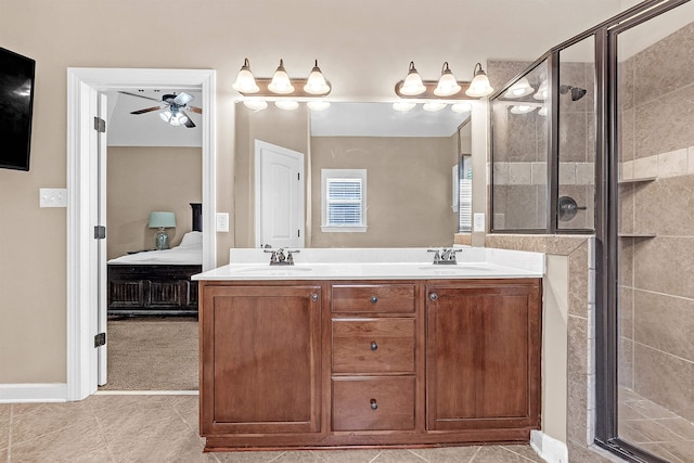 6836 Lagrange Grove Dr, Cordova, TN 38018 - bathroom featuring connected bathroom, double vanity, a stall shower, and ceiling fan