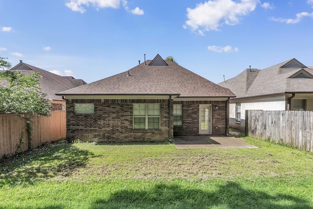 6836 Lagrange Grove Dr, Cordova, TN 38018 - rear view of house with a shingled roof, a fenced backyard, brick siding, and a patio area