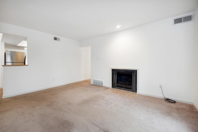 1824 Crossflower Cv Unit 94, Germantown, TN 38138 - unfurnished living room with carpet flooring, a fireplace with flush hearth, and recessed lighting