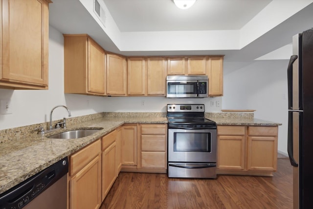 1824 Crossflower Cv Unit 94, Germantown, TN 38138 - kitchen featuring stainless steel appliances, dark wood finished floors, light stone countertops, and light brown cabinetry