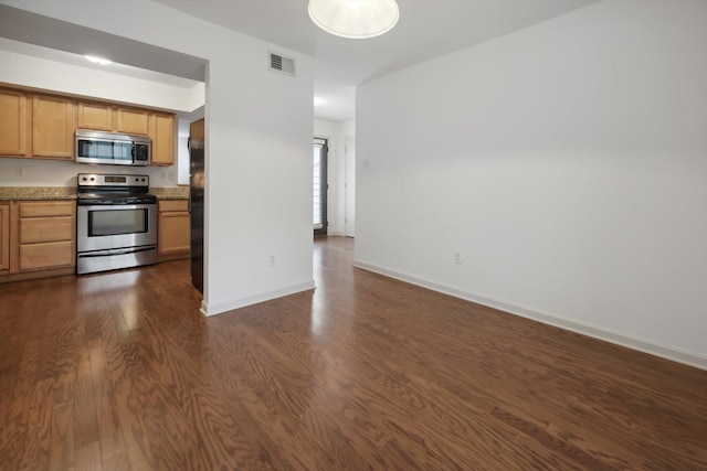 1824 Crossflower Cv Unit 94, Germantown, TN 38138 - kitchen with stainless steel appliances, dark wood-style floors, open floor plan, and light stone countertops