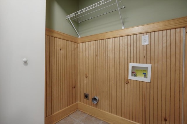 1824 Crossflower Cv Unit 94, Germantown, TN 38138 - laundry area with hookup for a washing machine, electric dryer hookup, wood walls, and tile patterned flooring