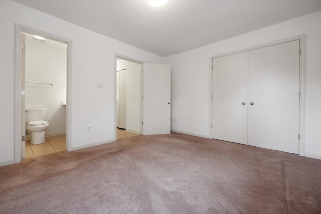 1824 Crossflower Cv Unit 94, Germantown, TN 38138 - unfurnished bedroom featuring light colored carpet, connected bathroom, and a closet
