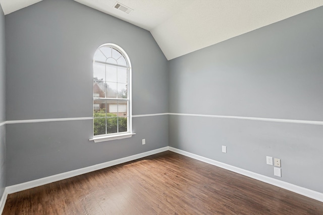 2766 Fletcher View Dr, Memphis, TN 38016 - unfurnished room with lofted ceiling and dark wood finished floors
