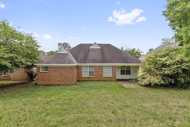 2766 Fletcher View Dr, Memphis, TN 38016 - rear view of property with a lawn, brick siding, and roof with shingles