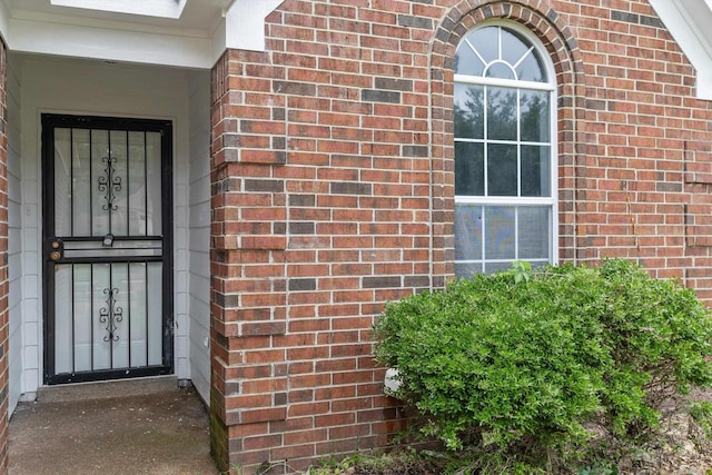 2766 Fletcher View Dr, Memphis, TN 38016 - view of exterior entry featuring brick siding