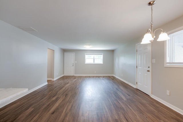 4825 Verne Rd, Memphis, TN 38117 - foyer featuring dark wood-style floors and a chandelier