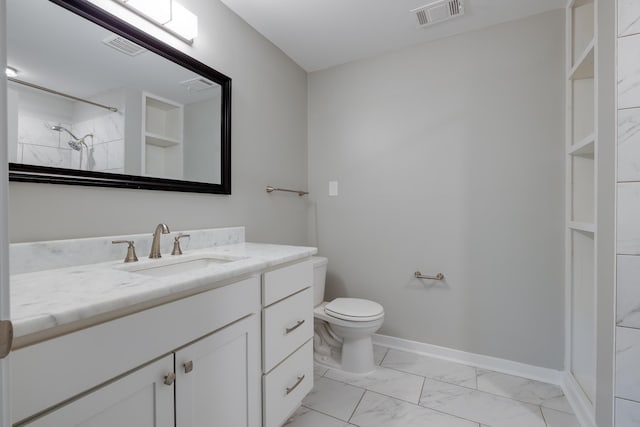4825 Verne Rd, Memphis, TN 38117 - full bathroom with marble look tile flooring, vanity, and a shower