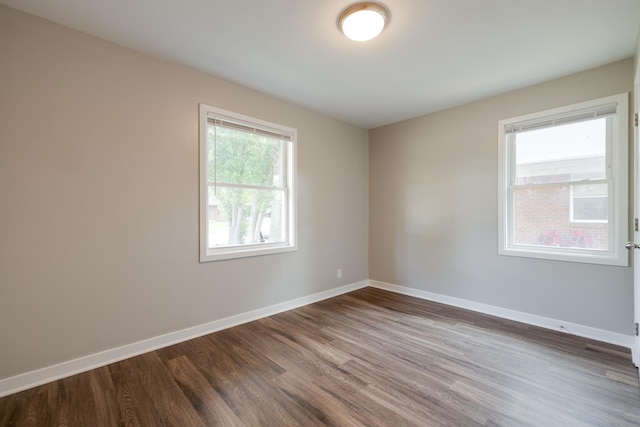 4825 Verne Rd, Memphis, TN 38117 - empty room with dark wood-type flooring and baseboards