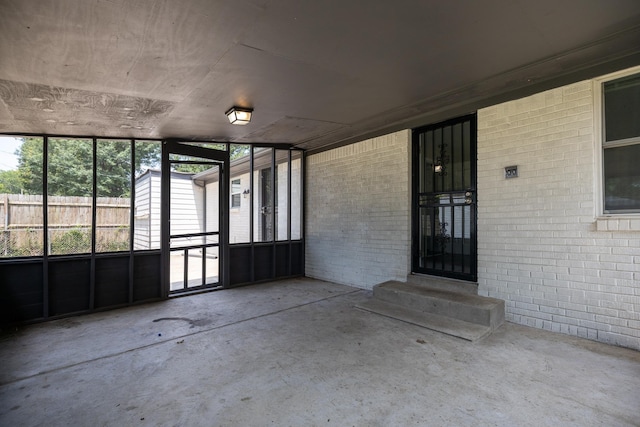 4825 Verne Rd, Memphis, TN 38117 - unfurnished sunroom featuring entry steps