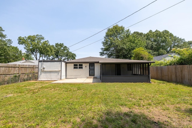 4825 Verne Rd, Memphis, TN 38117 - back of house featuring a patio area, a fenced backyard, and a sunroom