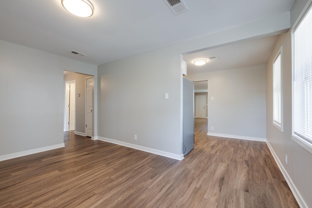 4825 Verne Rd, Memphis, TN 38117 - spare room with dark wood-style floors