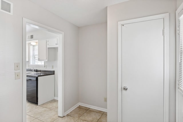 4338 Gardenview Dr, Memphis, TN 38116 - corridor with light tile patterned flooring and baseboards