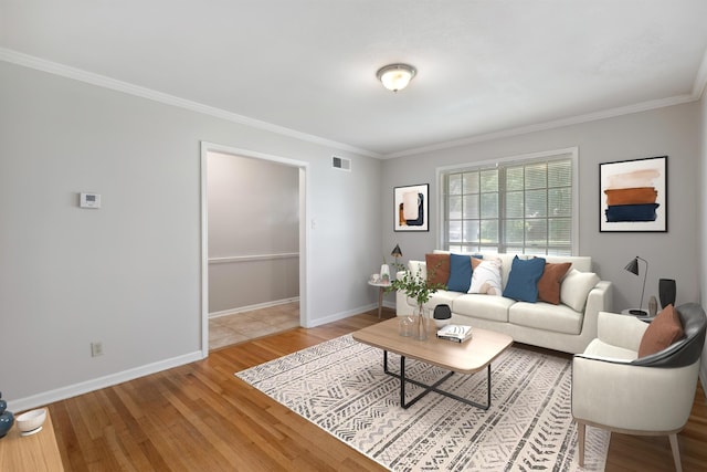 4338 Gardenview Dr, Memphis, TN 38116 - living area featuring crown molding and wood finished floors