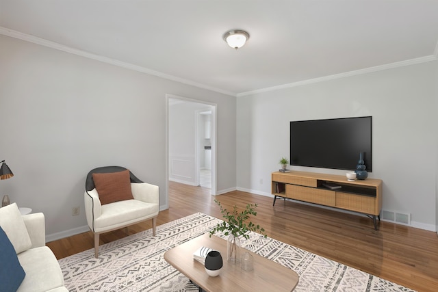 4338 Gardenview Dr, Memphis, TN 38116 - living room featuring crown molding and wood finished floors