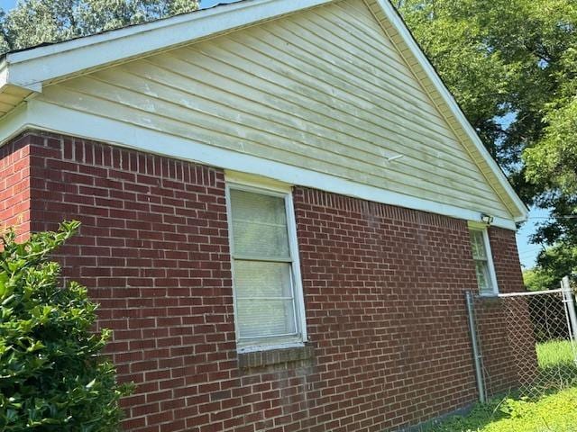 1827 S Orleans Ave, Memphis, TN 38106 - view of side of property featuring brick siding