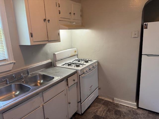 1827 S Orleans Ave, Memphis, TN 38106 - kitchen featuring white appliances, extractor fan, white cabinetry, and light countertops