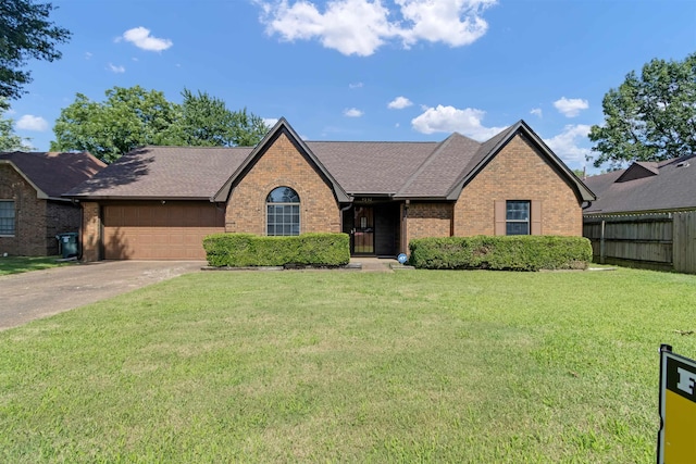 4532 Quail Flight Cv, Memphis, TN 38141 - view of front of home featuring brick siding, driveway, a shingled roof, and an attached garage