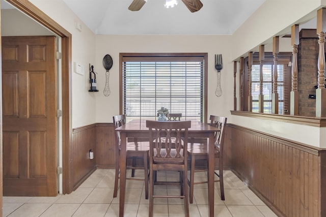 4532 Quail Flight Cv, Memphis, TN 38141 - dining room featuring wainscoting, ceiling fan, light tile patterned floors, and wood walls