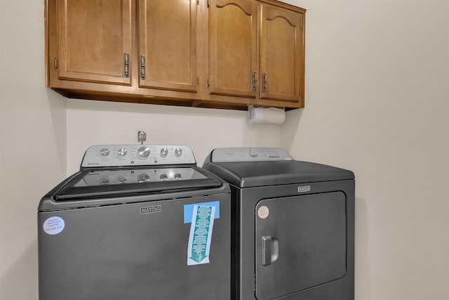 4532 Quail Flight Cv, Memphis, TN 38141 - laundry area featuring cabinet space and independent washer and dryer