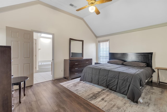 4532 Quail Flight Cv, Memphis, TN 38141 - bedroom with vaulted ceiling, wood finished floors, a ceiling fan, and ensuite bathroom