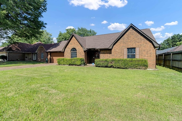 4532 Quail Flight Cv, Memphis, TN 38141 - view of front of property with brick siding, an attached garage, driveway, and a shingled roof