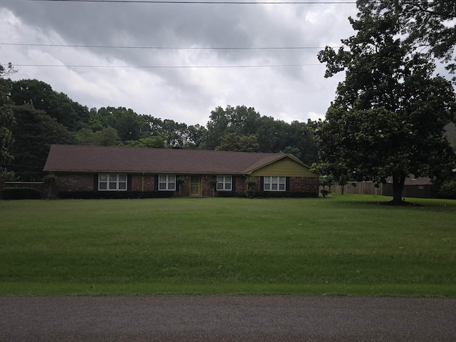 8355 Craven Rd, Bartlett, TN 38002 - ranch-style home featuring a front yard and brick siding