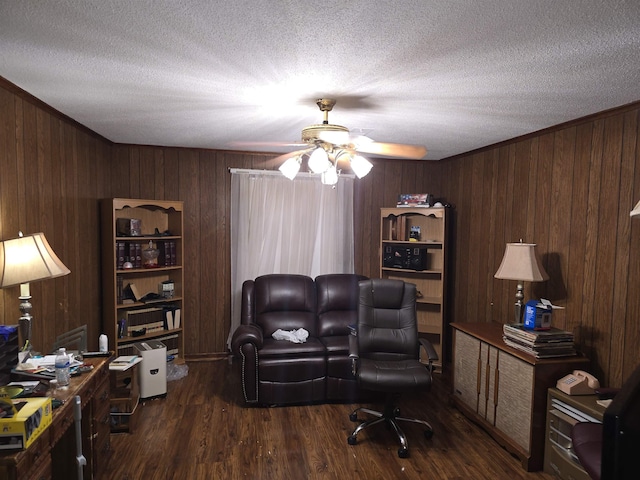 8355 Craven Rd, Bartlett, TN 38002 - home office featuring wooden walls, a ceiling fan, a textured ceiling, dark wood-type flooring, and ornamental molding