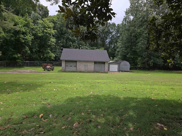 8355 Craven Rd, Bartlett, TN 38002 - view of yard featuring a garage and a shed