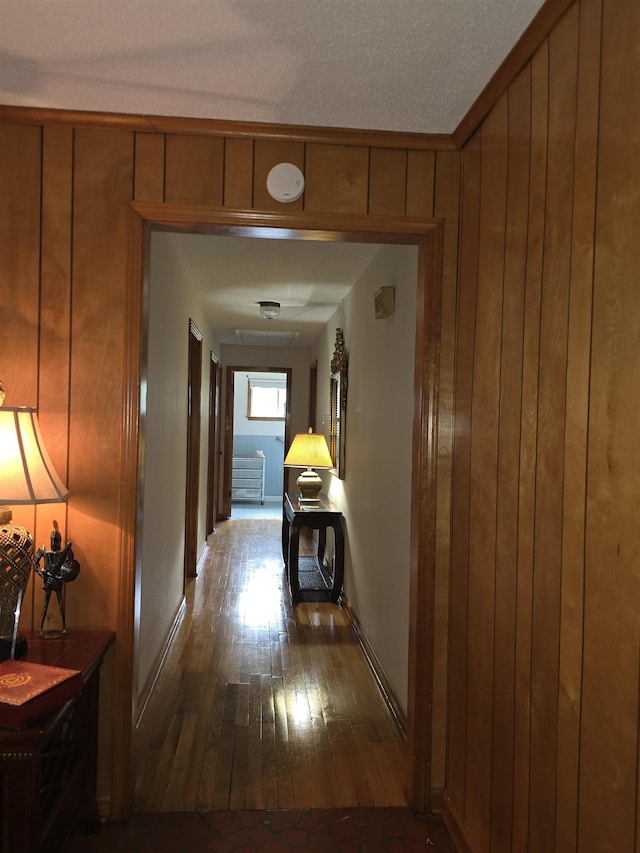 8355 Craven Rd, Bartlett, TN 38002 - hallway with hardwood / wood-style flooring and wood walls
