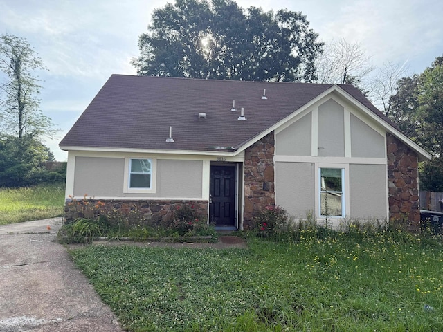 3816 Cedar Path Dr, Memphis, TN 38115 - view of front facade with stone siding, stucco siding, and a shingled roof