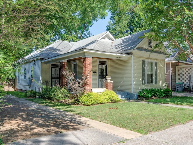 699 New York St, Memphis, TN 38104 - view of front of home featuring a front yard