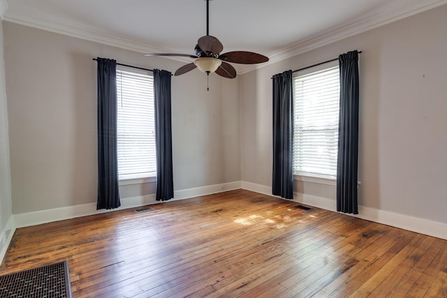 699 New York St, Memphis, TN 38104 - spare room featuring crown molding, light wood finished floors, plenty of natural light, and ceiling fan